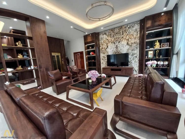 Bộ sofa gỗ óc chó tạo điểm nhấn đẳng cấp và đầy cuốn hút.